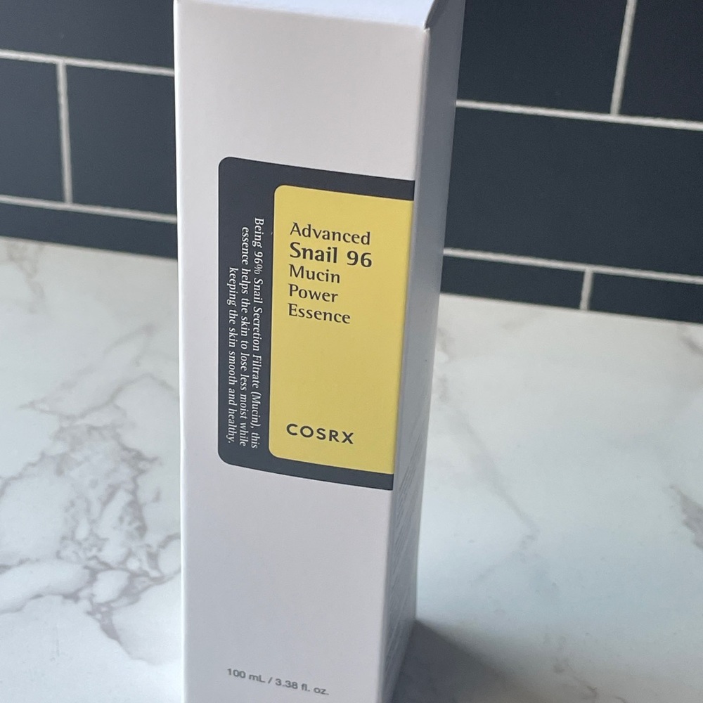 COS Advanced Snail 96 Mucin Power Essence in White and Black